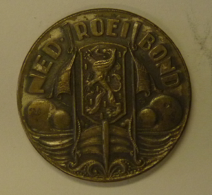 Zilverkleurige penning Nederlandse Roeibond 1964