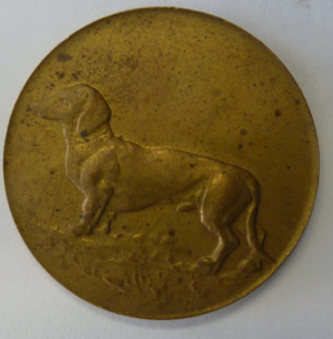 Reclamepenning Frolic, hondenserie,  Belgium